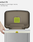 A Perfect Fit. Say goodbye to loose bags—secure, snug, and slip-free. A hand holds an open metallic cooler unit, revealing a yellow, mesh-patterned insert within the lid.