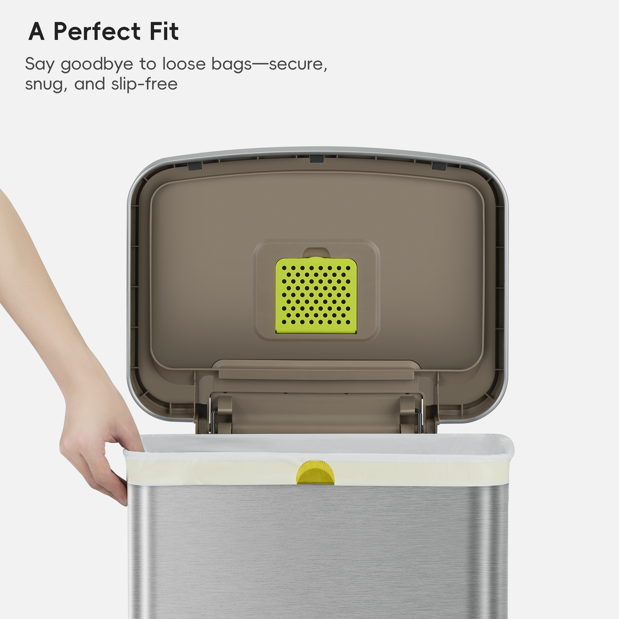 A Perfect Fit. Say goodbye to loose bags—secure, snug, and slip-free. A hand holds an open metallic cooler unit, revealing a yellow, mesh-patterned insert within the lid.